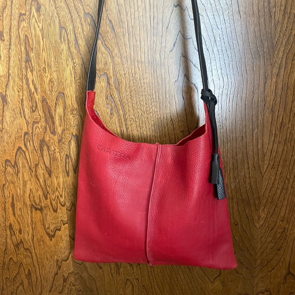 Super cute Cartera Cross body.